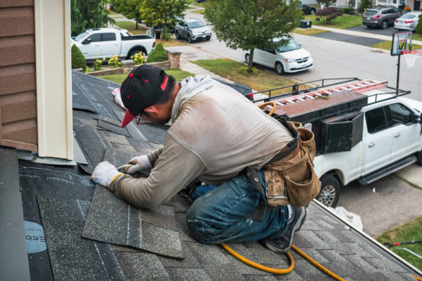 Professional Roofing technician working in Harvard, ID